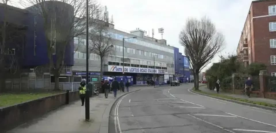 Exterior view of Loftus Road Stadium with fans