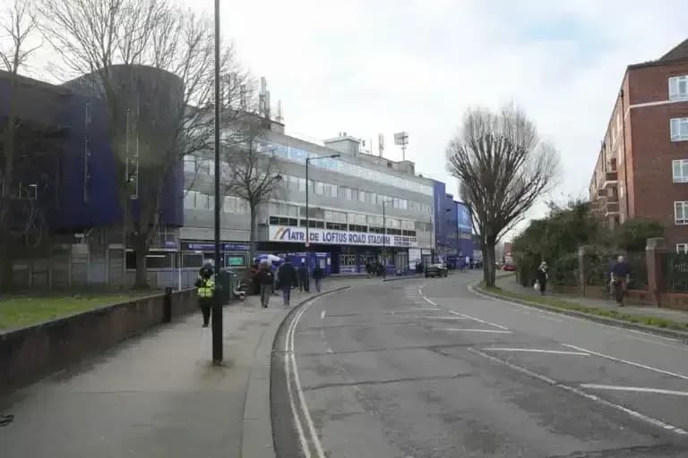 Exterior view of Loftus Road Stadium with fans