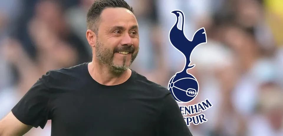 Entrenador de Tottenham sonriente en el campo