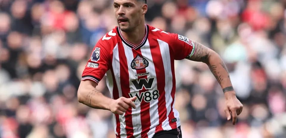 Jugador de Sunderland corriendo en el campo
