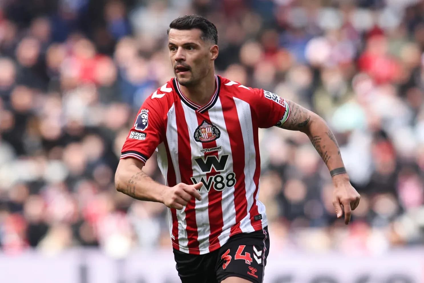 Jugador de Sunderland corriendo en el campo