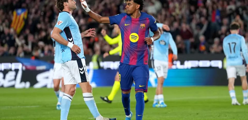 Jugadores de Barcelona y Celta Vigo en acción