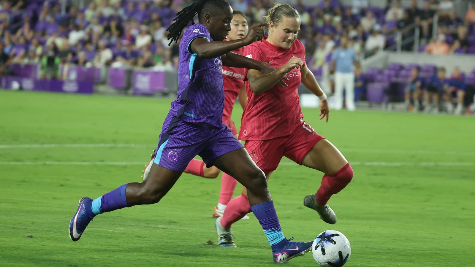 Jugadora de Orlando Pride en acción contra Boston Legacy