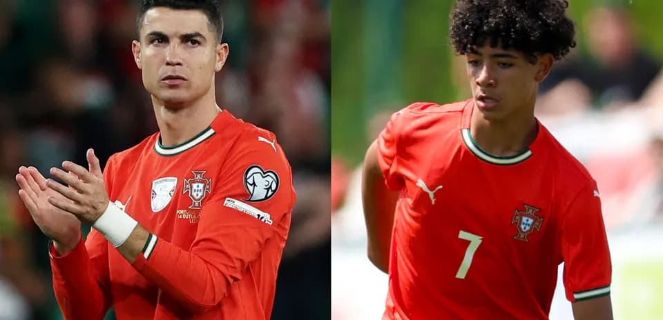 Dos jugadores de Portugal en uniforme naranja