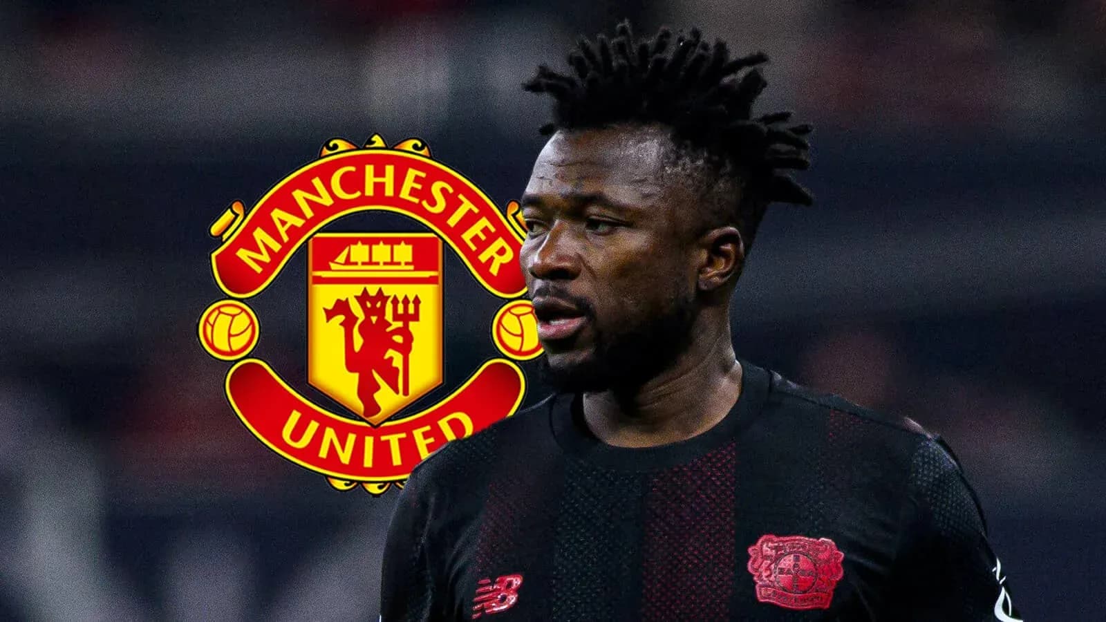 Jugador con camiseta negra frente al logo de Manchester United