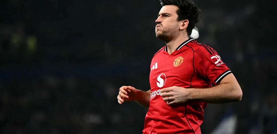 Jugador de Manchester United corriendo en el campo