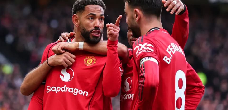 Jugadores de Manchester United celebrando un gol