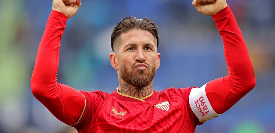 Jugador levantando los brazos en celebración