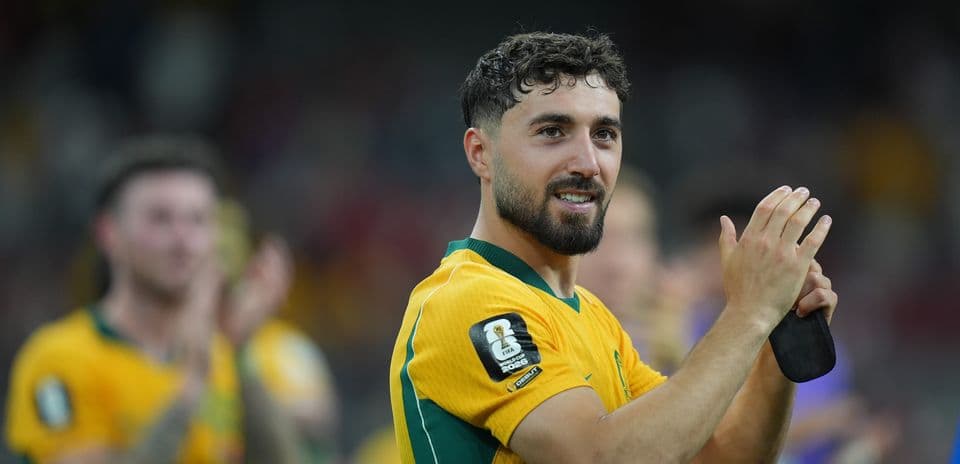 Jugador australiano aplaudiendo tras el partido