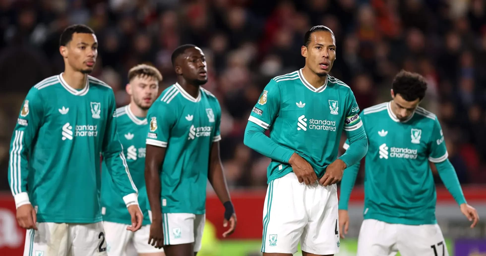 Jugadores de Liverpool en el campo