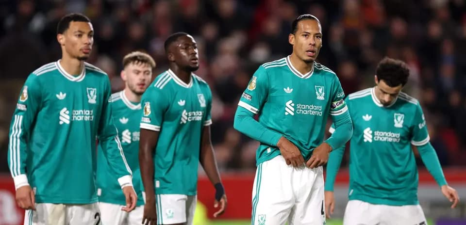 Jugadores de Liverpool en el campo