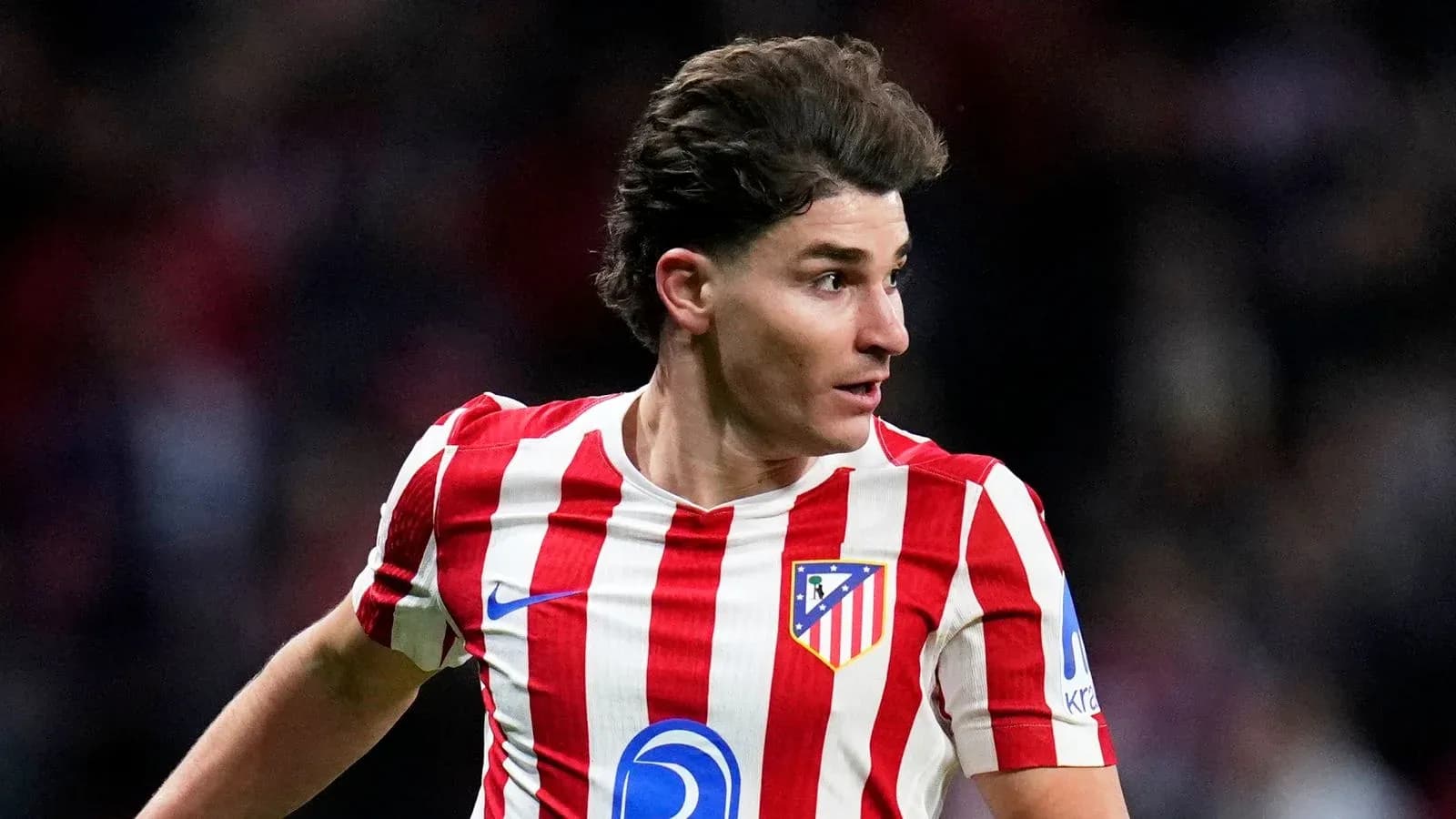 Jugador de Atlético de Madrid en acción durante partido