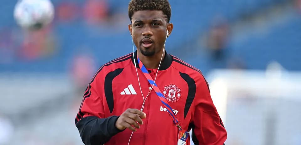 Jugador de Manchester United en calentamiento previo al partido