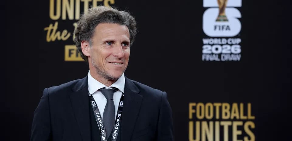 Persona sonriendo en el evento del sorteo del Mundial 2026