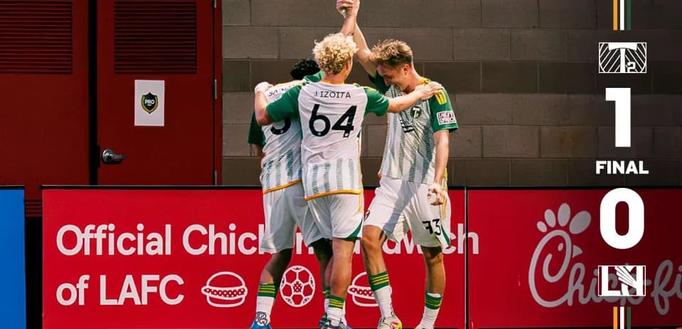 Jugadores del Portland Timbers II celebrando un gol