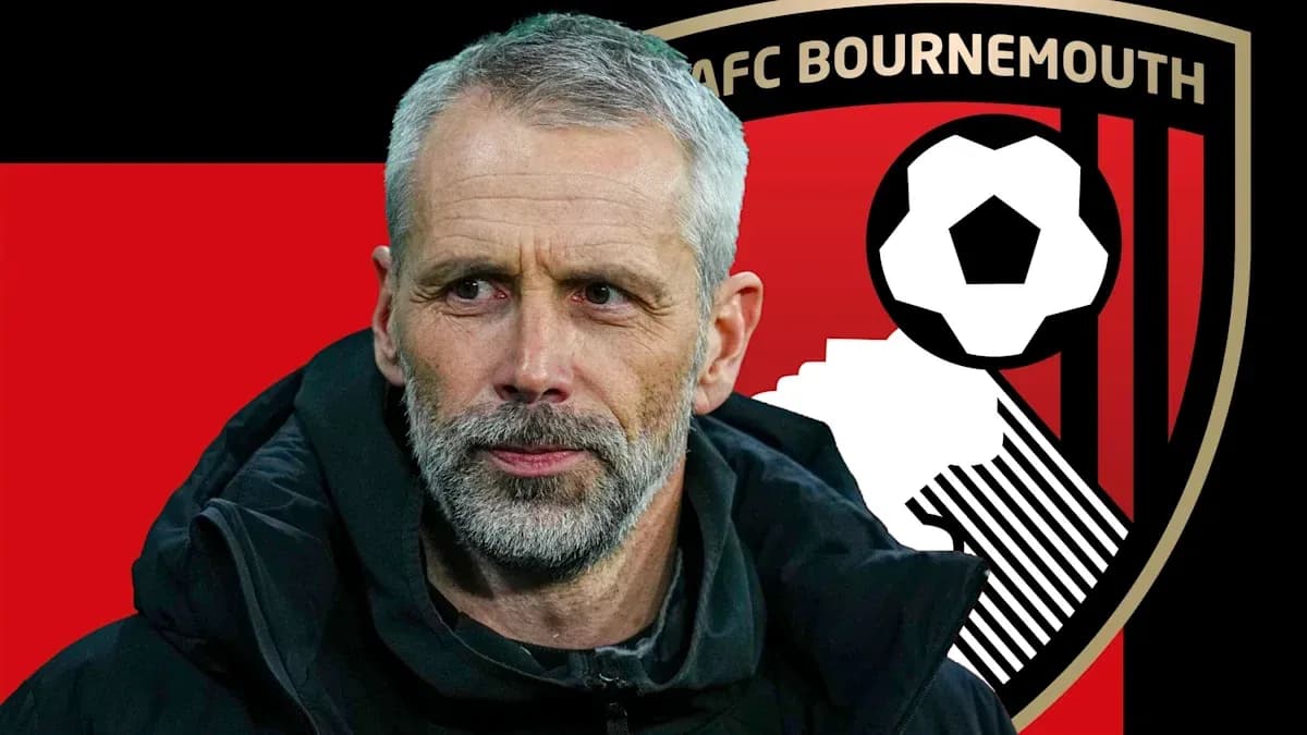 Entrenador de AFC Bournemouth con logo de fondo