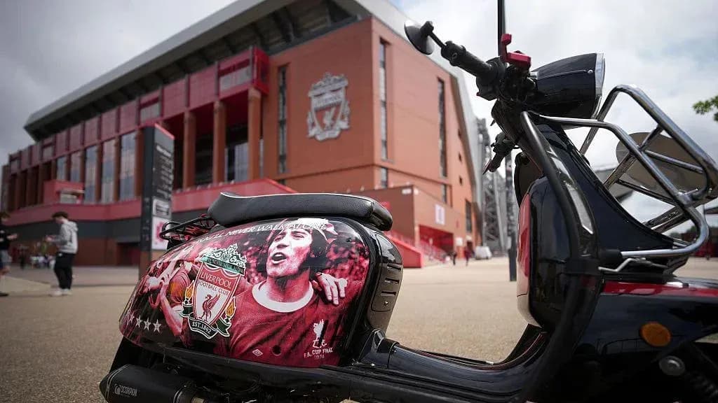 Scooter decorated with Liverpool FC logo outside Anfield