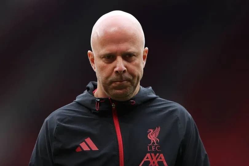 Entrenador de Liverpool F.C. en el campo
