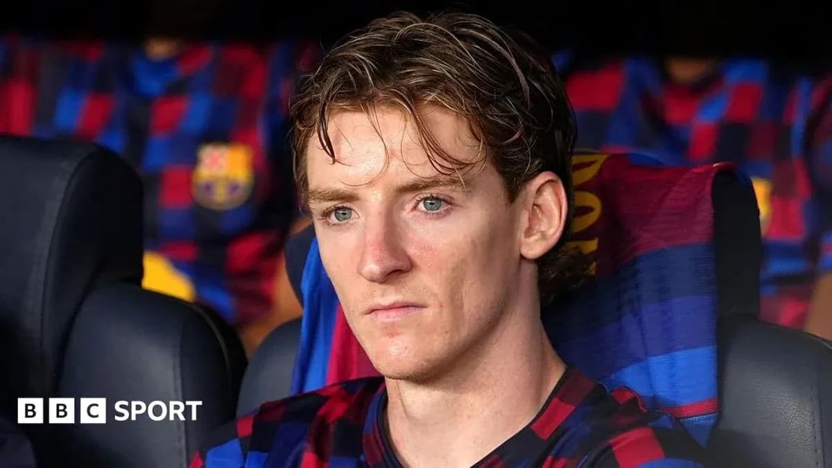 Jugador sentado en el banquillo del FC Barcelona