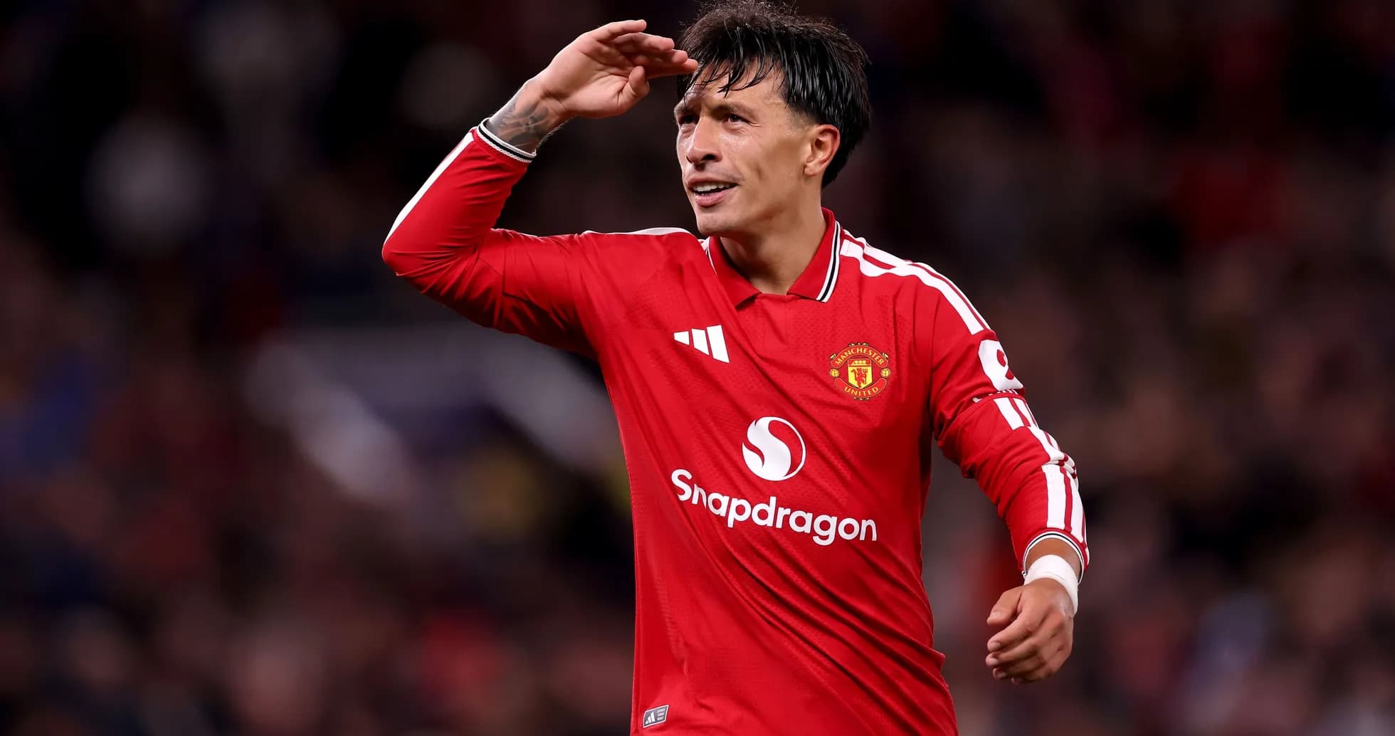Jugador de Manchester United saludando durante un partido