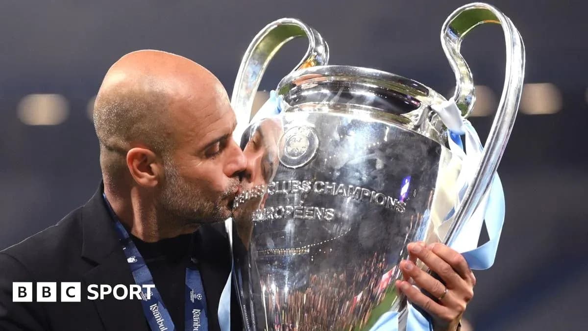 Entrenador besando la copa de la Champions League