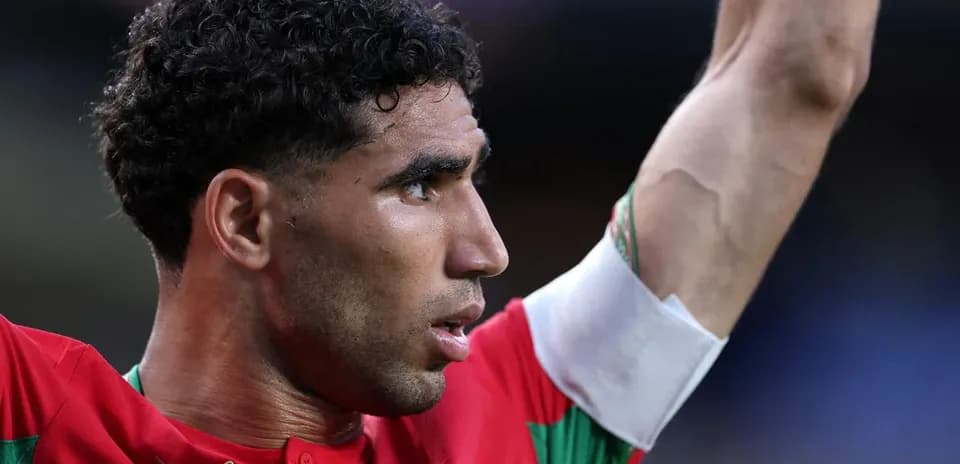 Jugador levantando el brazo en celebración