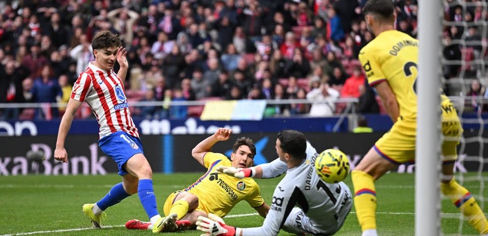 Jugadores de Atlético de Madrid en acción