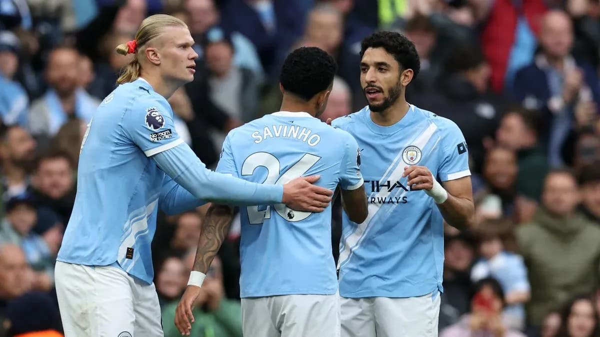 Jugadores de Manchester City celebrando un gol