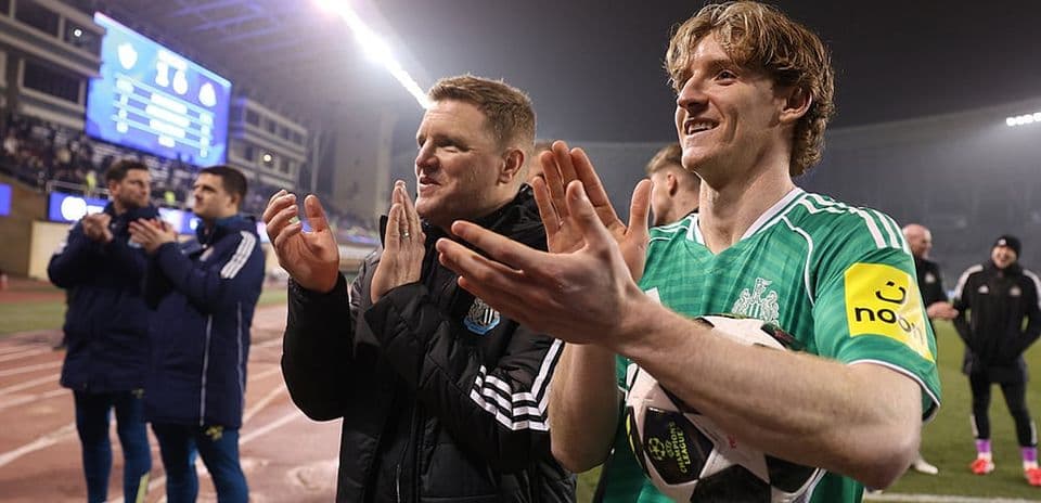 Anthony Gordon scores during the match.