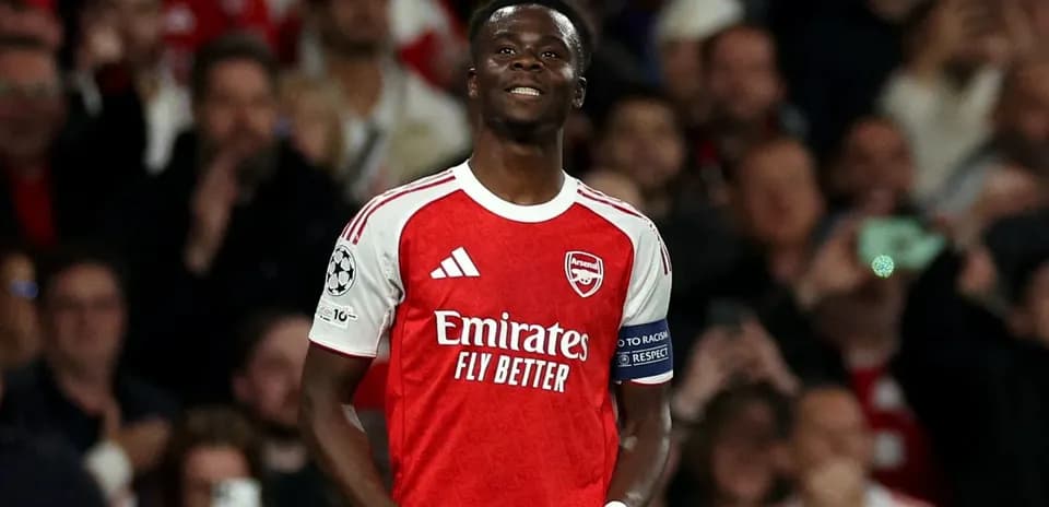 Jugador de Arsenal celebrando un gol en el estadio