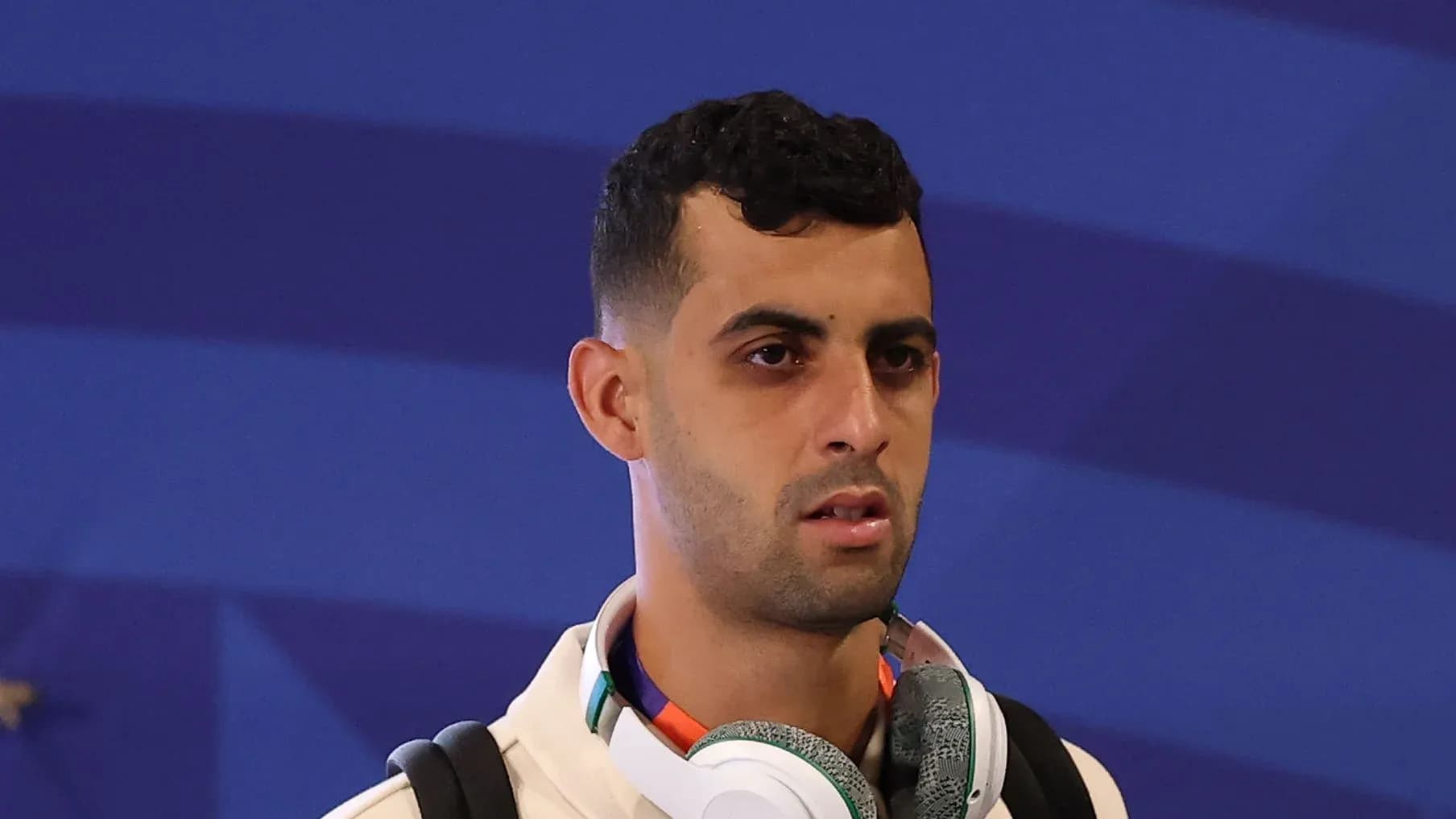 Jugador con auriculares en evento deportivo