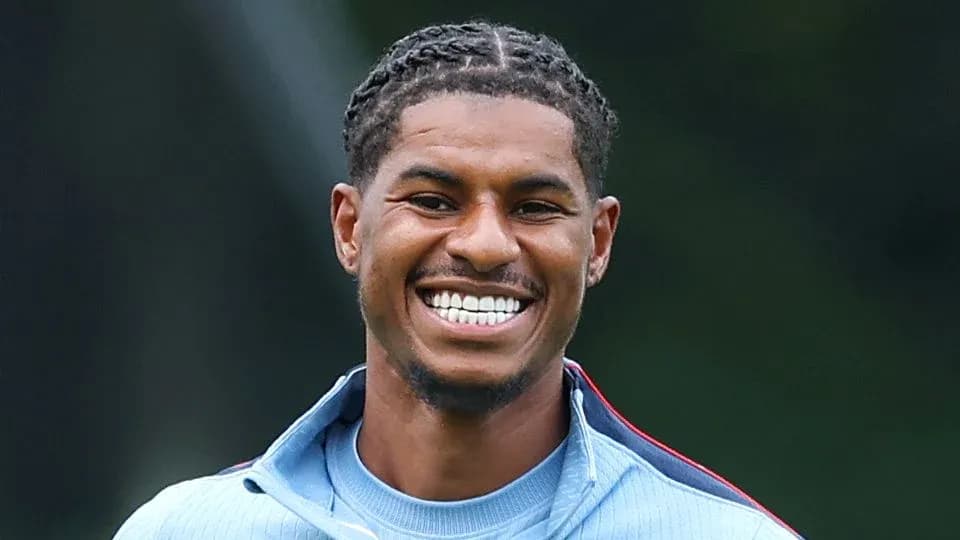 Jugador sonriente durante la sesión de entrenamiento Jugador sonriente durante la sesión de entrenamiento