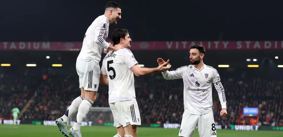 Jugadores celebrando un gol en Vitality Stadium Jugadores celebrando un gol en Vitality Stadium