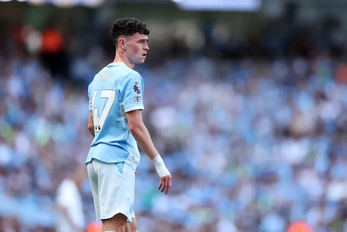 Jugador de Manchester City en acción durante el partido Jugador de Manchester City en acción durante el partido