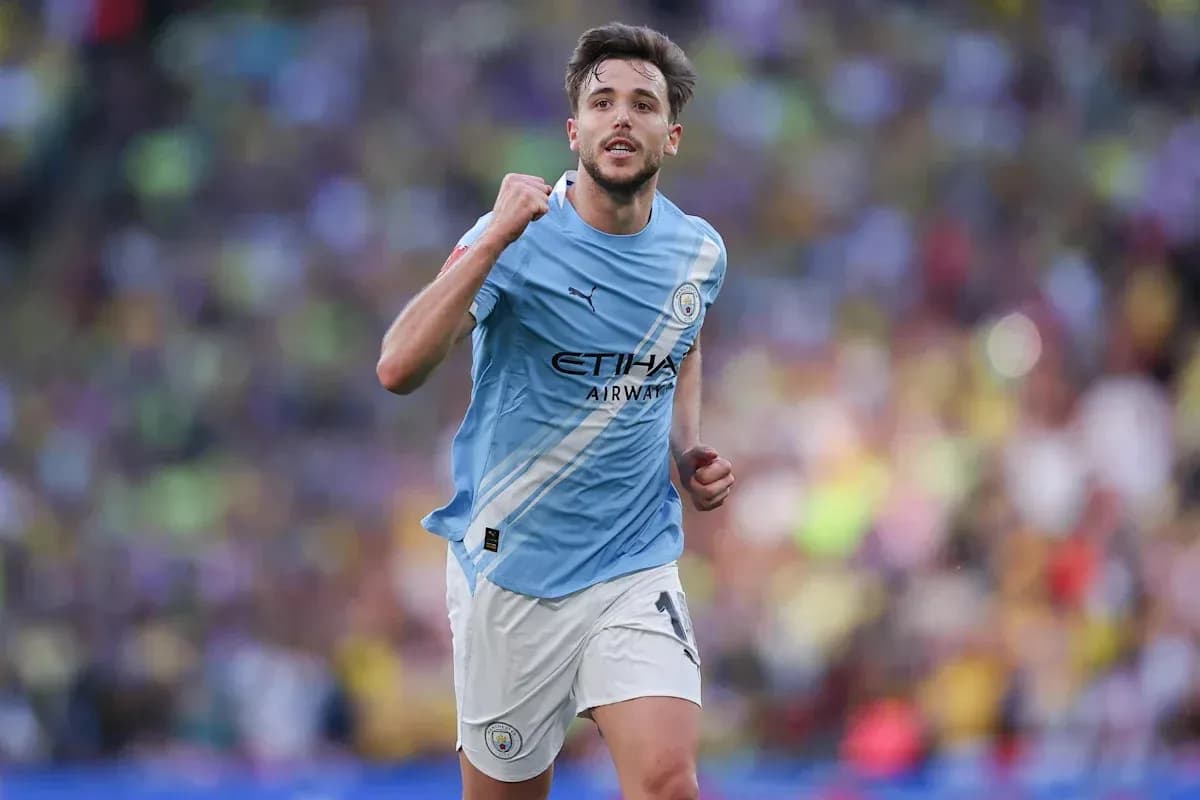 Jugador de Manchester City celebrando un gol Jugador de Manchester City celebrando un gol