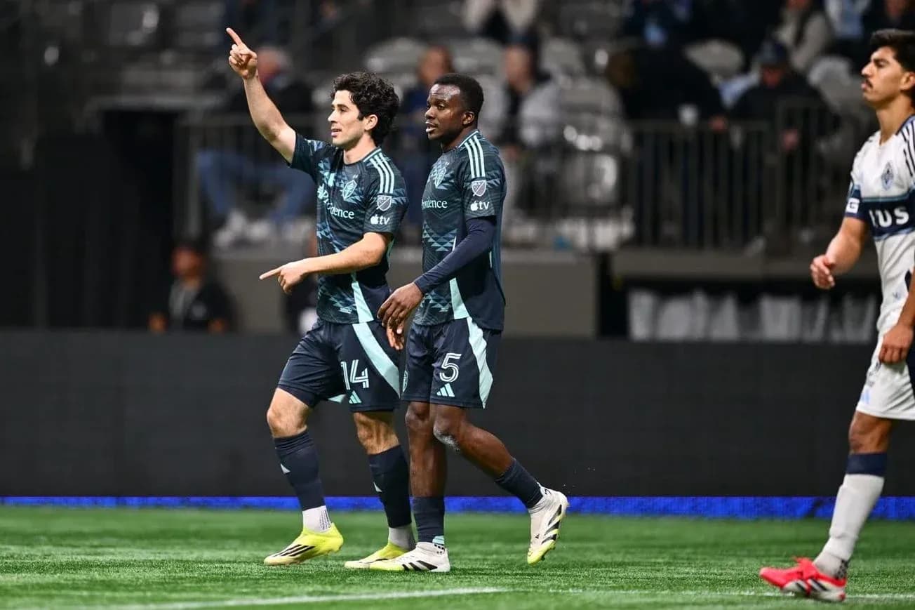 Jugadores de Seattle Sounders celebrando un gol Jugadores de Seattle Sounders celebrando un gol
