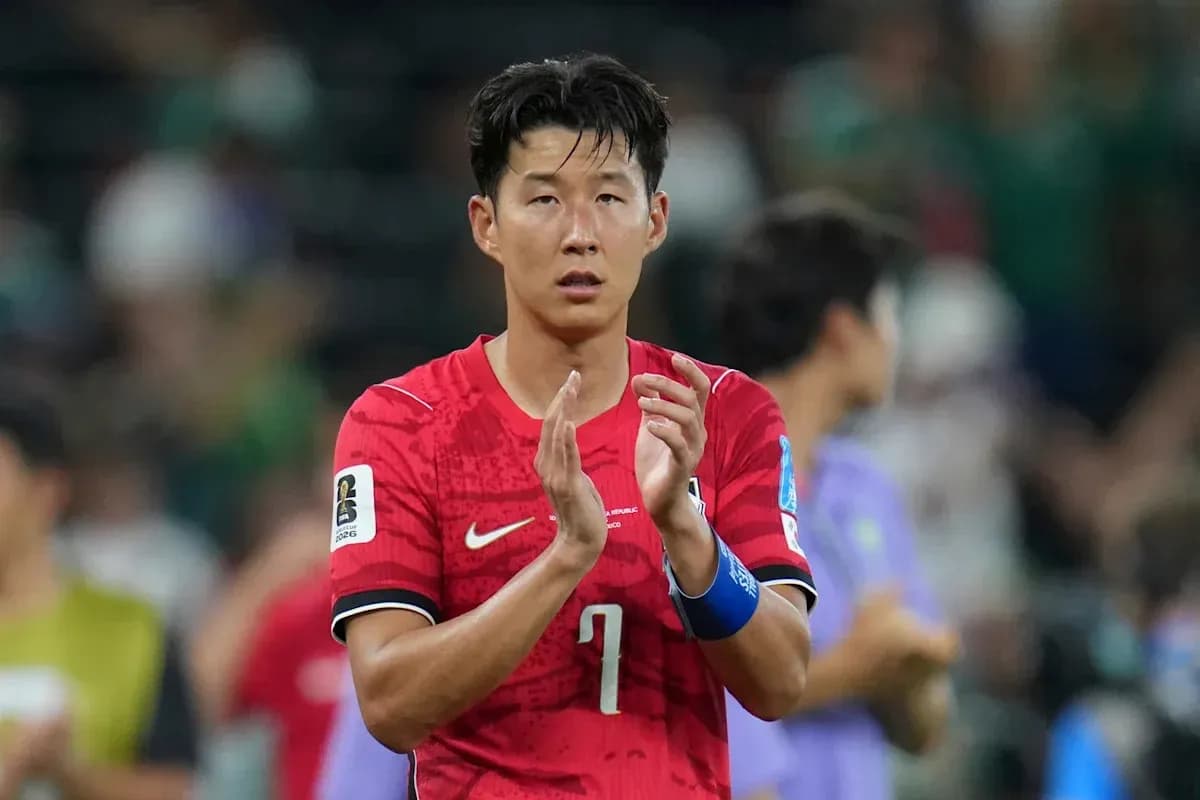 Jugador aplaudiendo en uniforme de Corea del Sur Jugador aplaudiendo en uniforme de Corea del Sur
