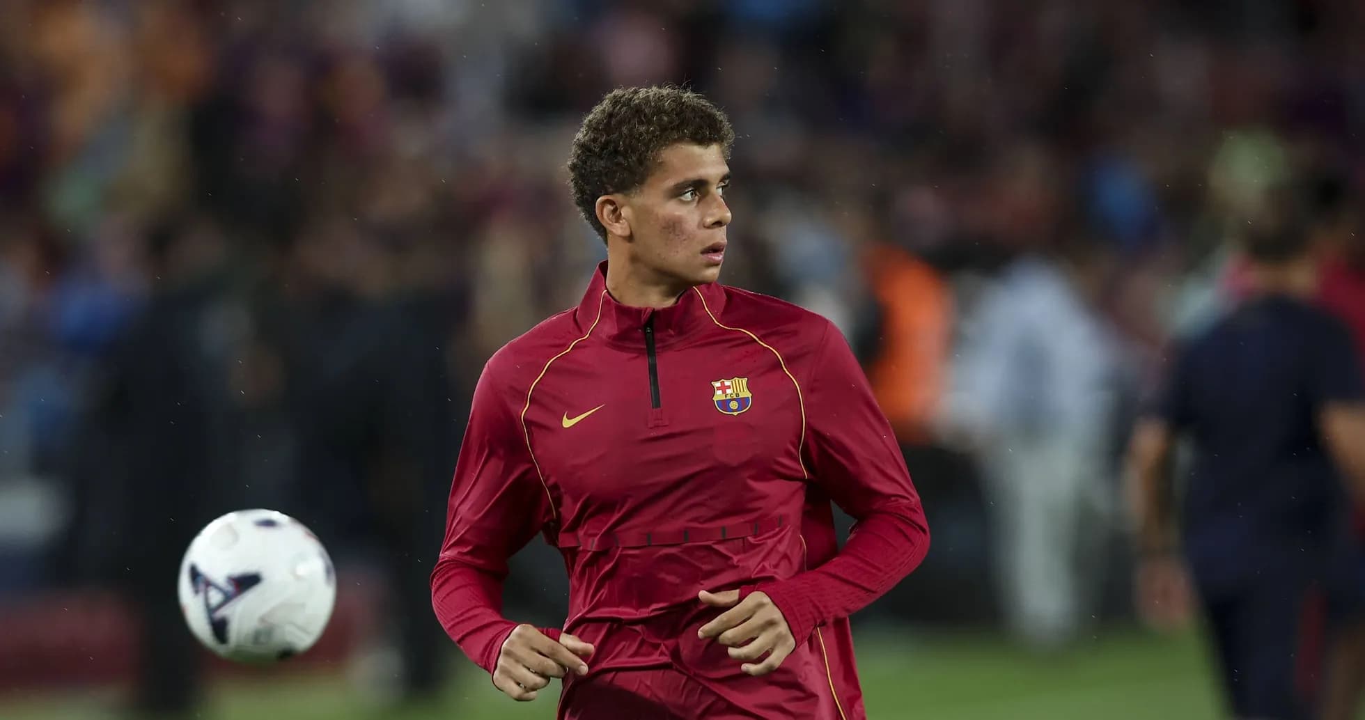 Jugador de Barcelona calentando antes del partido Jugador de Barcelona calentando antes del partido