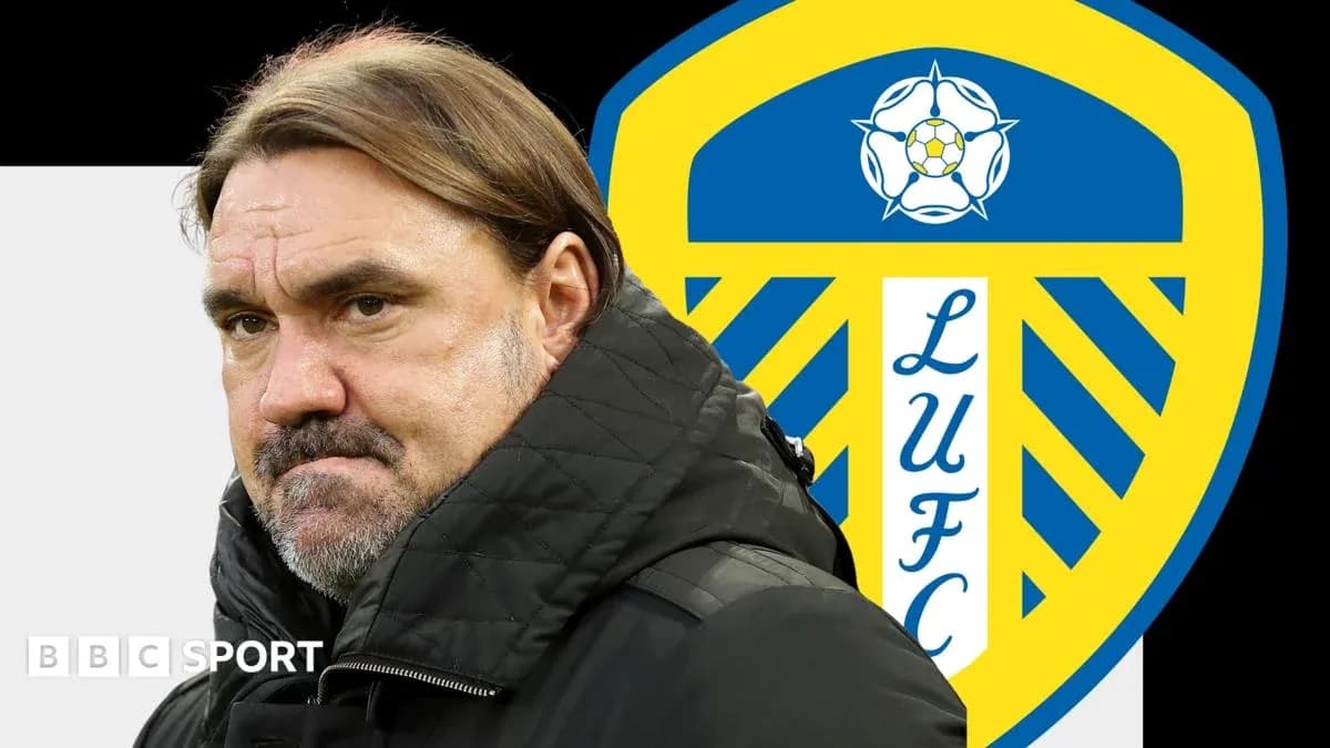 Entrenador frente al escudo de Leeds United Entrenador frente al escudo de Leeds United