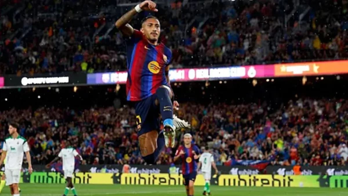 Jugador de Barcelona celebrando un gol en el estadio Jugador de Barcelona celebrando un gol en el estadio
