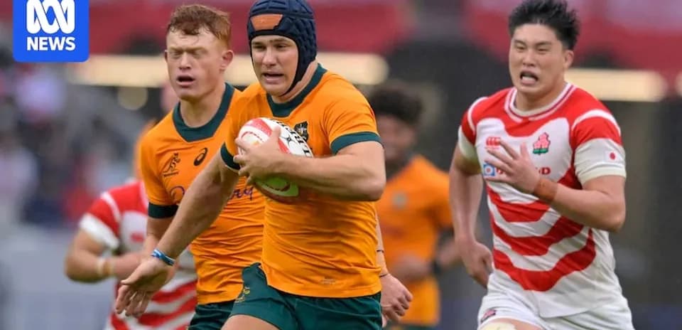 Jugador australiano avanzando con el balón en partido Jugador australiano avanzando con el balón en partido