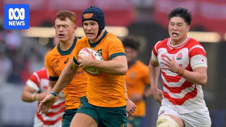 Jugador australiano avanzando con el balón en partido Jugador australiano avanzando con el balón en partido