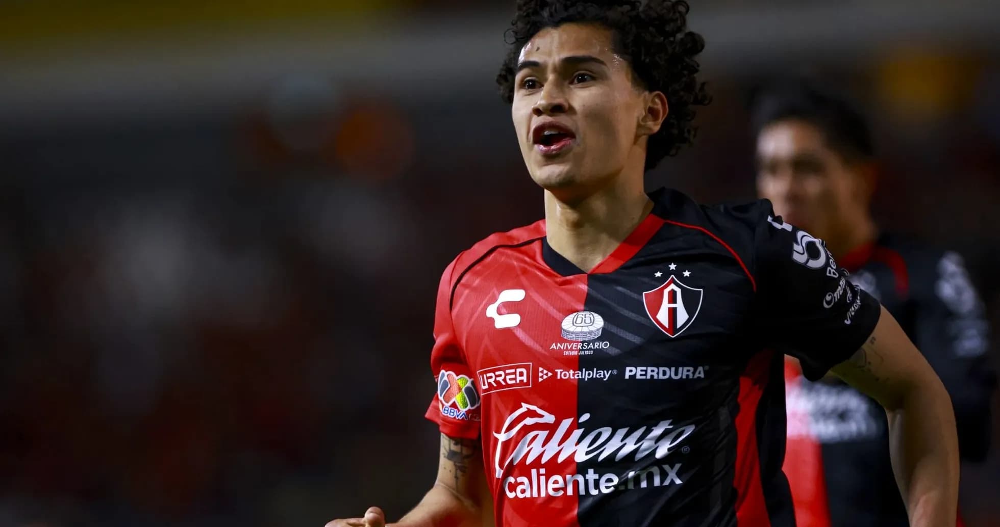 Jugador de Atlas celebrando un gol Jugador de Atlas celebrando un gol