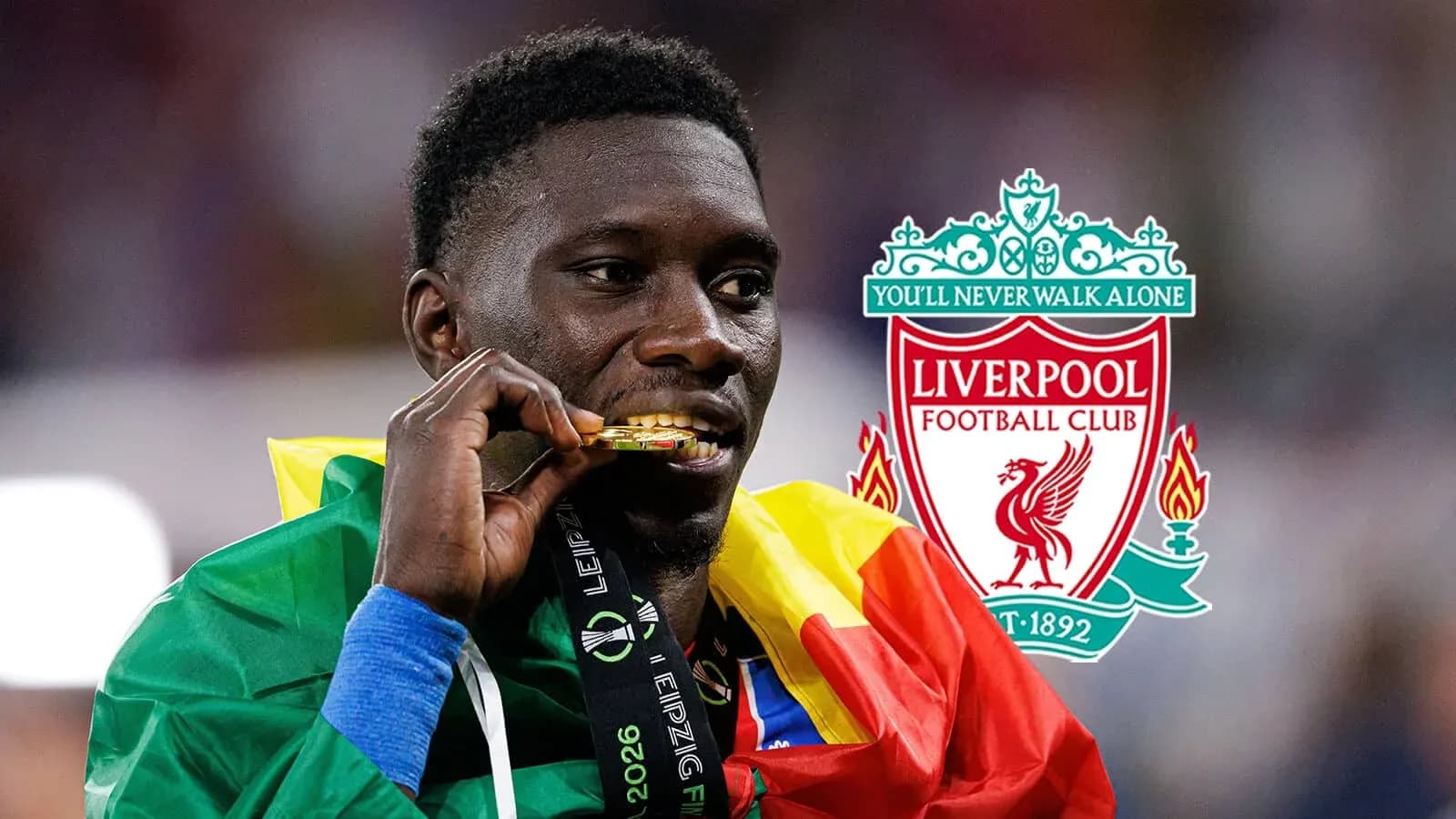 Jugador con medalla de oro y bandera de Camerún Jugador con medalla de oro y bandera de Camerún