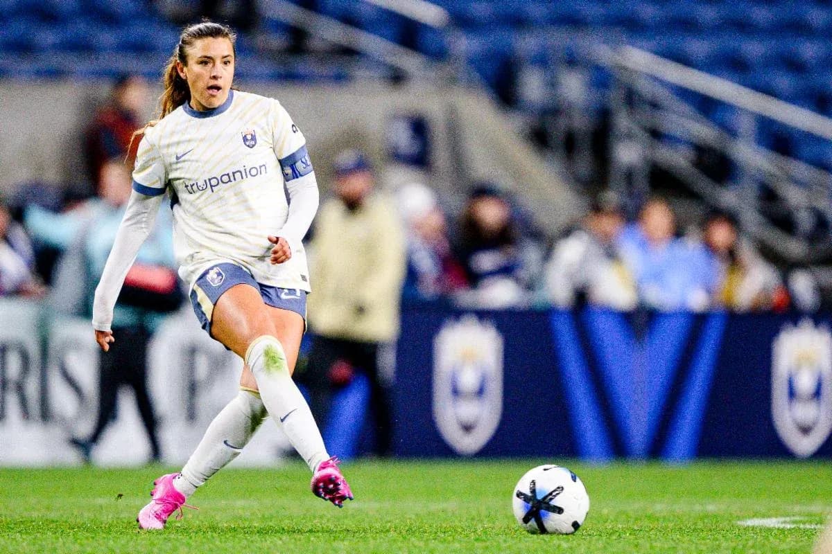 Jugadora del Seattle Reign FC en acción Jugadora del Seattle Reign FC en acción
