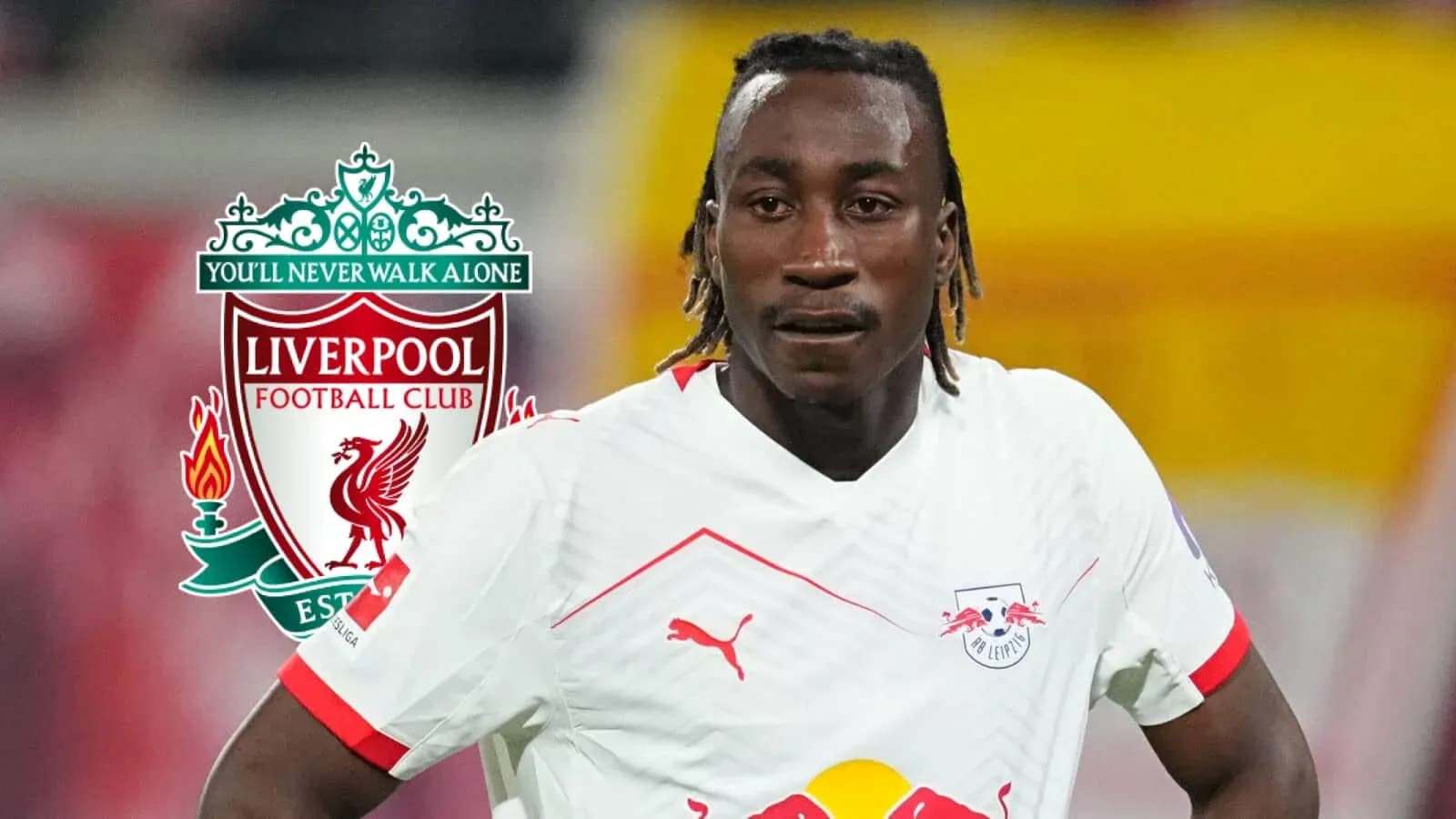 Jugador de RB Leipzig frente al logo de Liverpool Jugador de RB Leipzig frente al logo de Liverpool